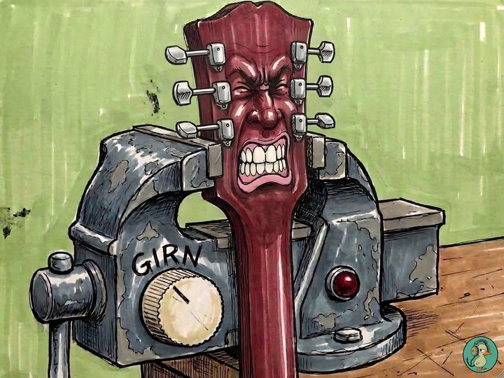 Girn: a guitar headstock carved into a snarling face with gritted teeth, clamped in a bench vice with a Girn knob and a lamp